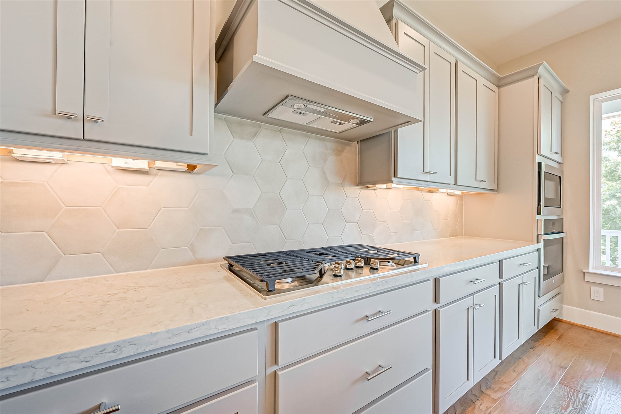 67 Thorpe Lane Spring, TX 77389 - Photo 16 of 27 a kitchen with granite countertop a sink cabinets and stainless steel appliances