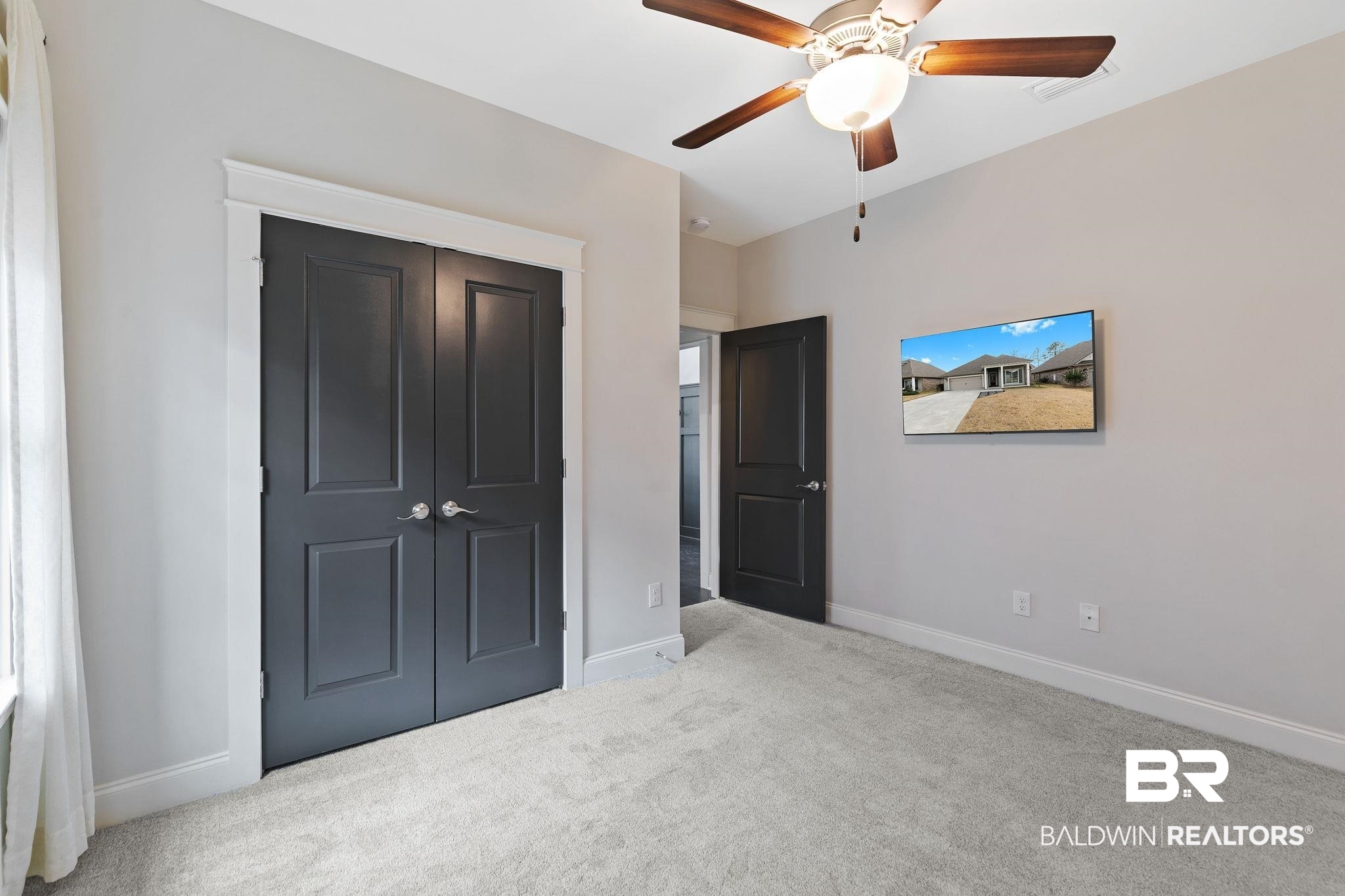 31654 Canopy Loop Daphne, AL 36527 - Photo 41 of 64 Unfurnished bedroom featuring carpet floors, a closet, and a ceiling fan