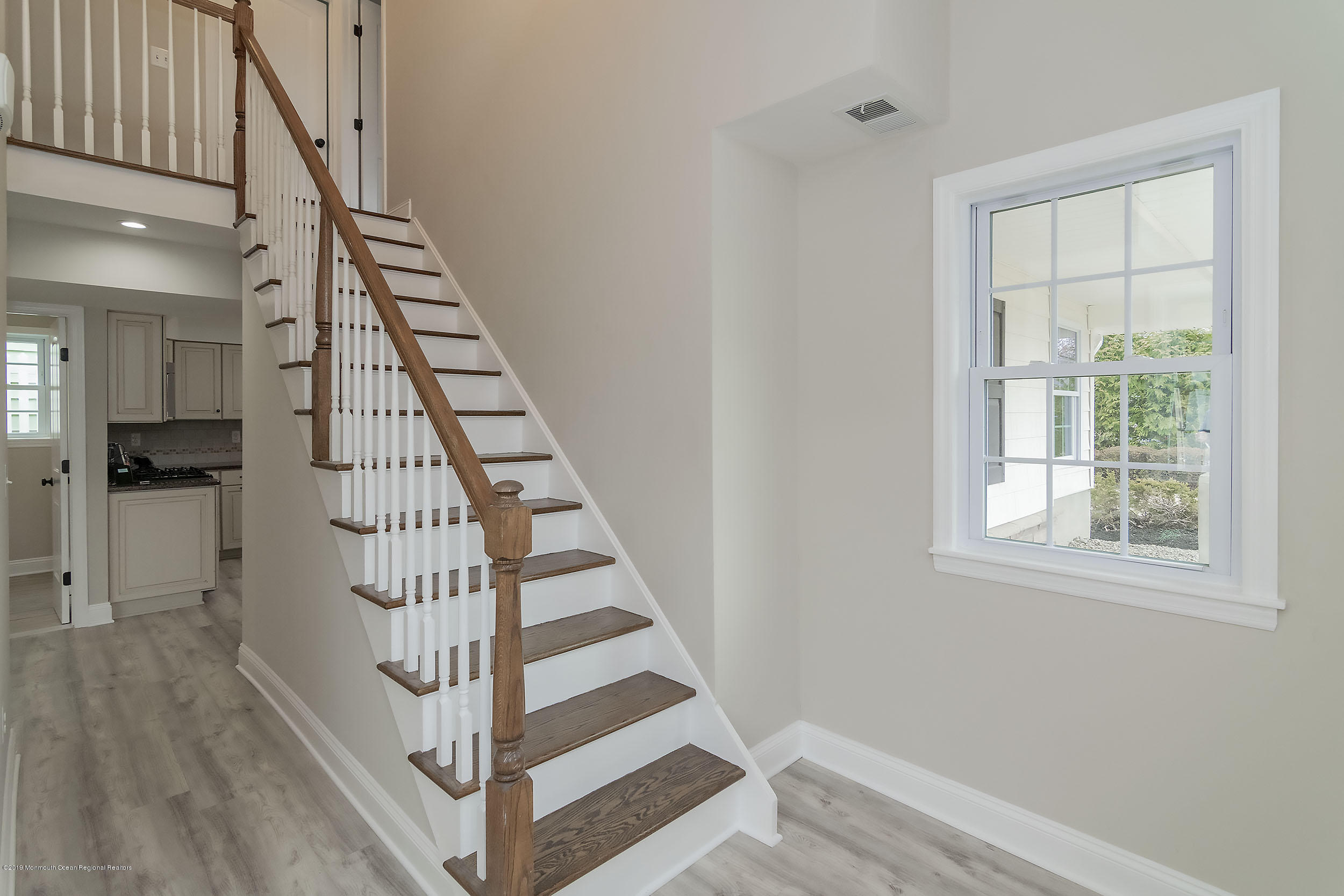 1521 Treeneedle Road Point Pleasant, NJ 08742 - Photo 18 of 33 a view of entryway and hall with wooden floor