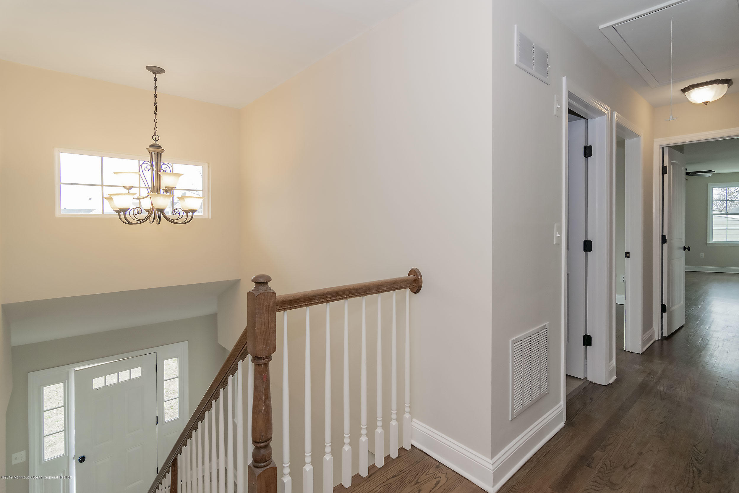 1521 Treeneedle Road Point Pleasant, NJ 08742 - Photo 20 of 33 a view of a room with wooden floor