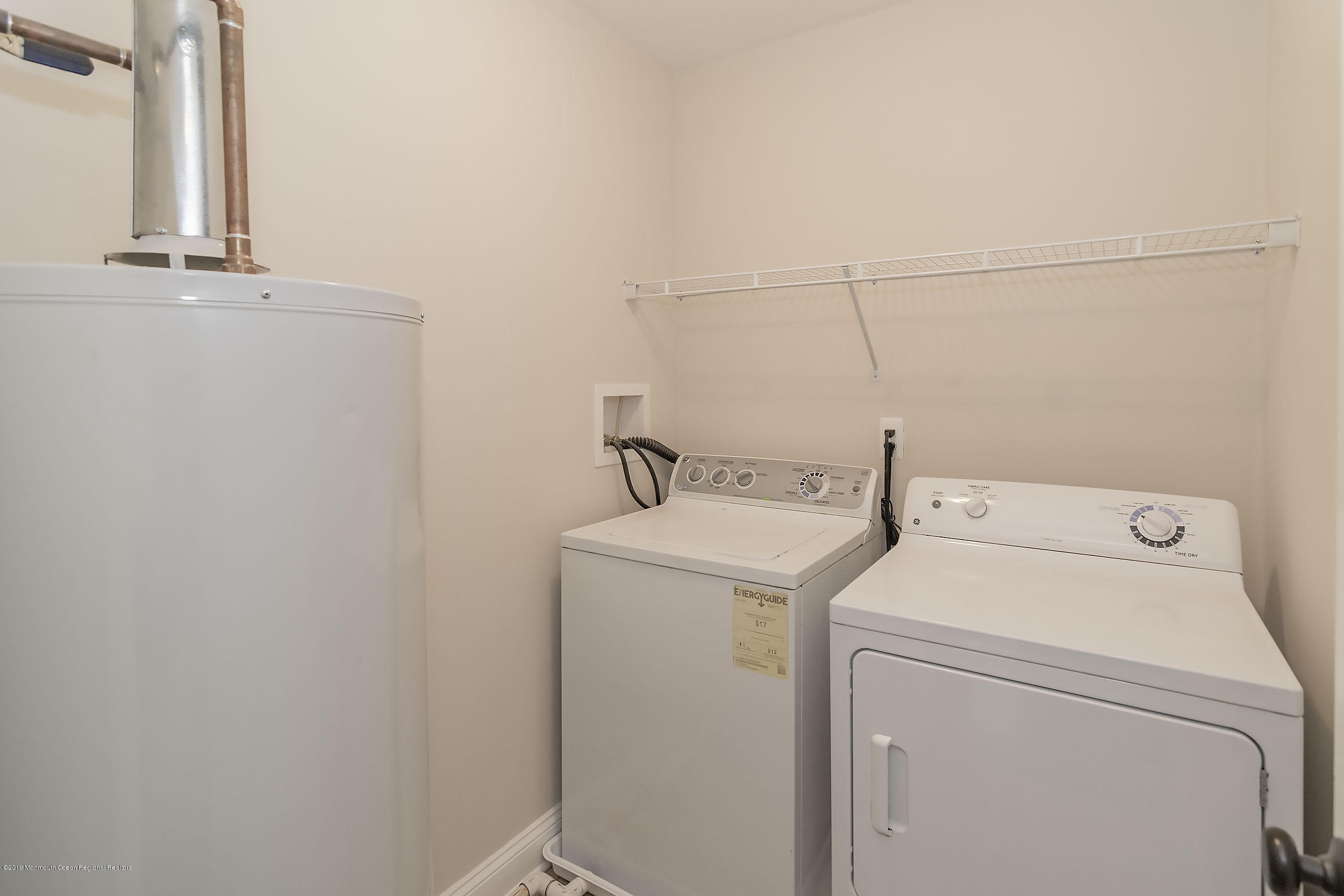 1521 Treeneedle Road Point Pleasant, NJ 08742 - Photo 30 of 33 a utility room with dryer and washer