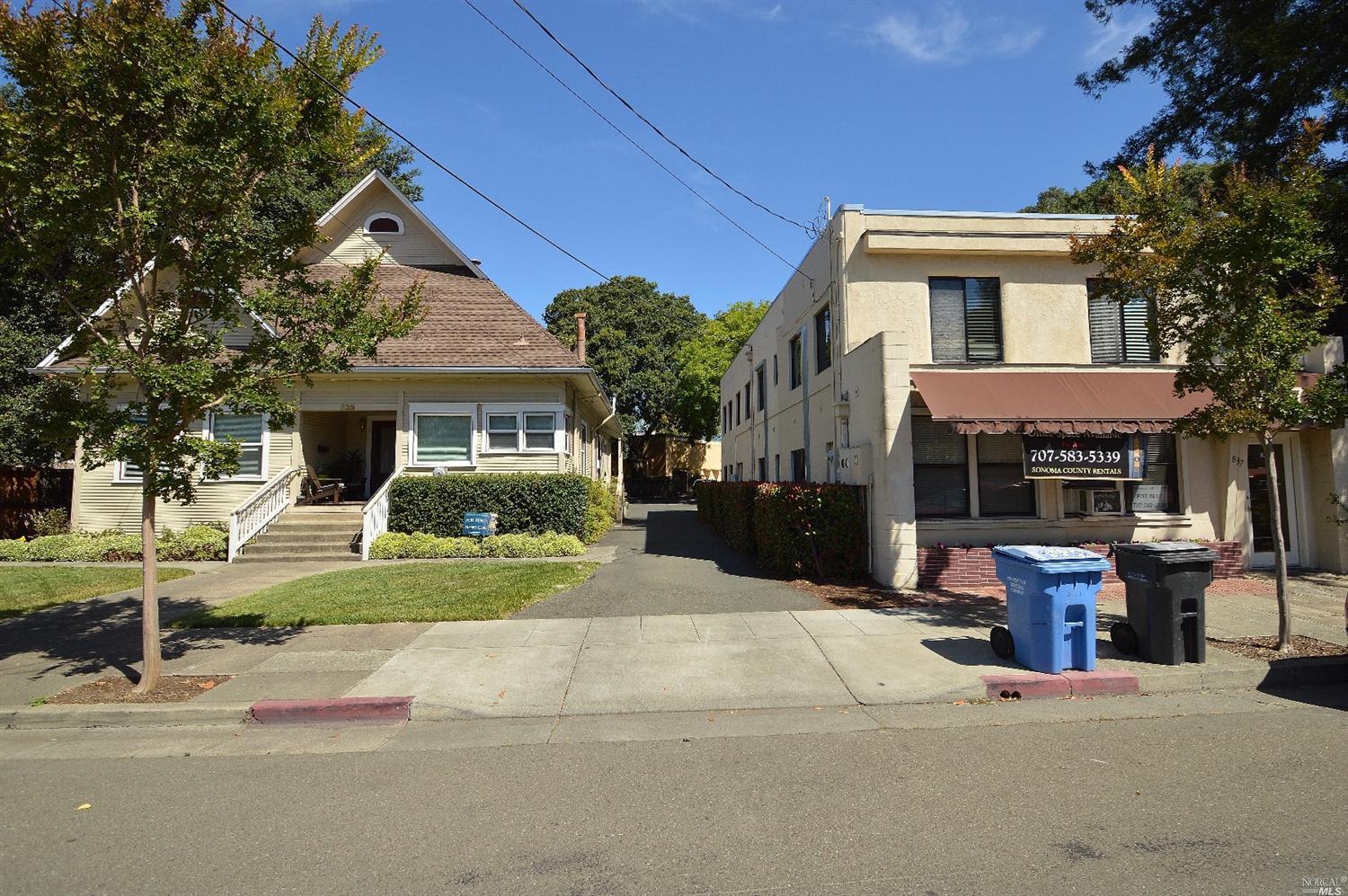 837 5th Street Santa Rosa, CA 95404 - Photo 1 of 1 a front view of a house with a yard and potted plants