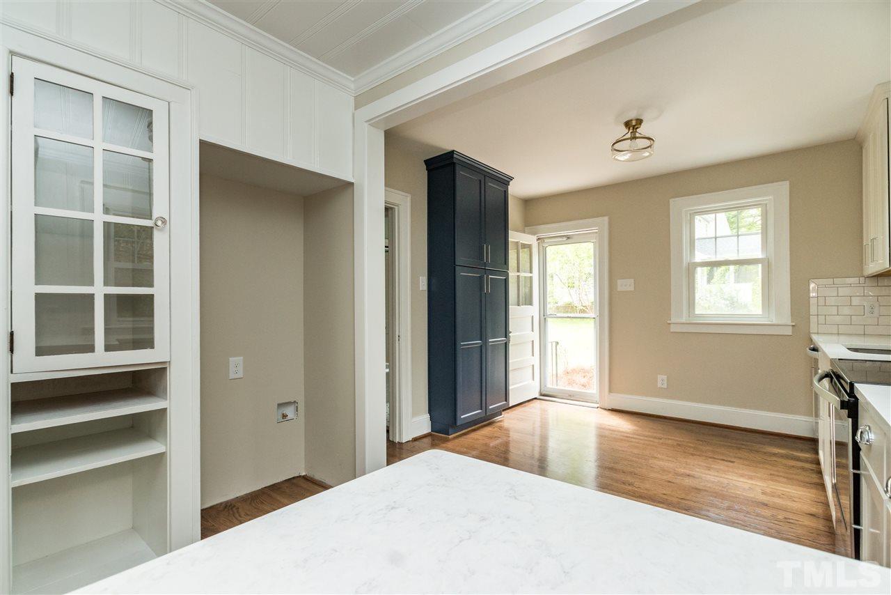 2503 Mayview Road Raleigh, NC 27607 - Photo 12 of 20 a bedroom with a bed and a window