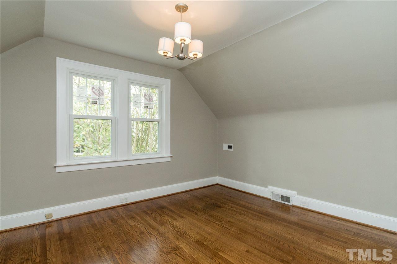 2503 Mayview Road Raleigh, NC 27607 - Photo 17 of 20 a view of wooden floor and windows in a room