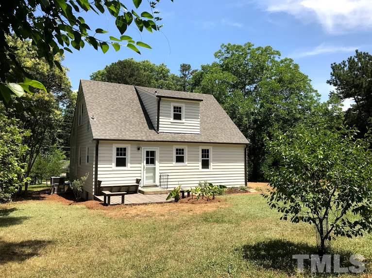 2503 Mayview Road Raleigh, NC 27607 - Photo 3 of 20 a front view of a house with a yard