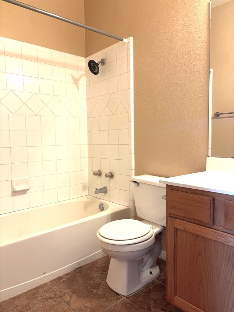 2869 Southampton Way, Unit B Round Rock, TX 78664 - Photo 13 of 19 Bathroom with shower tub combo.