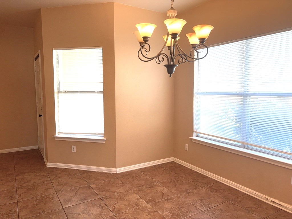 2869 Southampton Way, Unit B Round Rock, TX 78664 - Photo 5 of 19 Dining area between living and kitchen with double window.