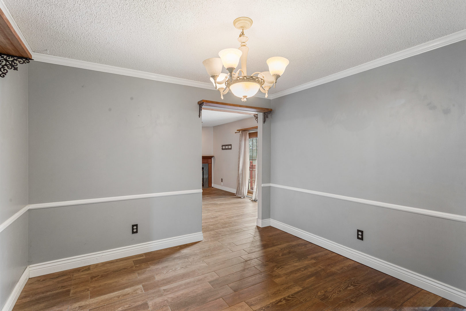 2211 Carlisle Drive Champaign, IL 61821 - Photo 11 of 34 a view of an empty room with wooden floor