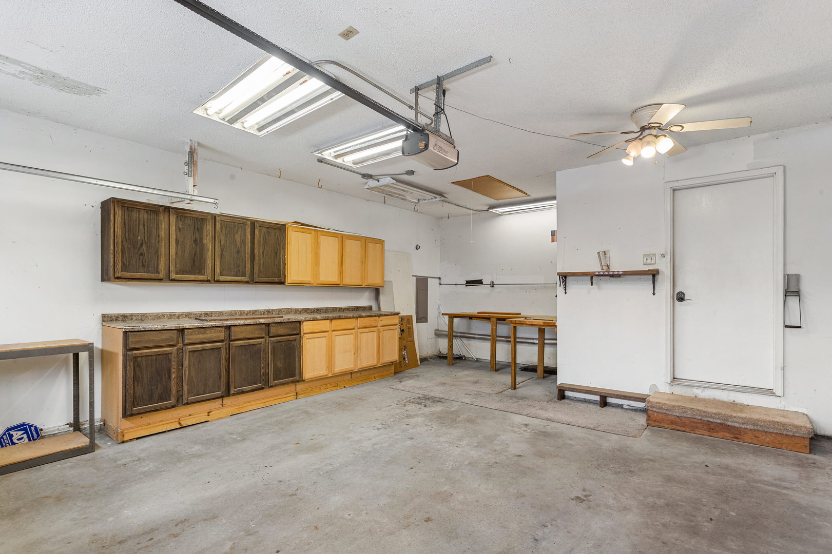 2211 Carlisle Drive Champaign, IL 61821 - Photo 28 of 34 a large kitchen with cabinets and stainless steel appliances