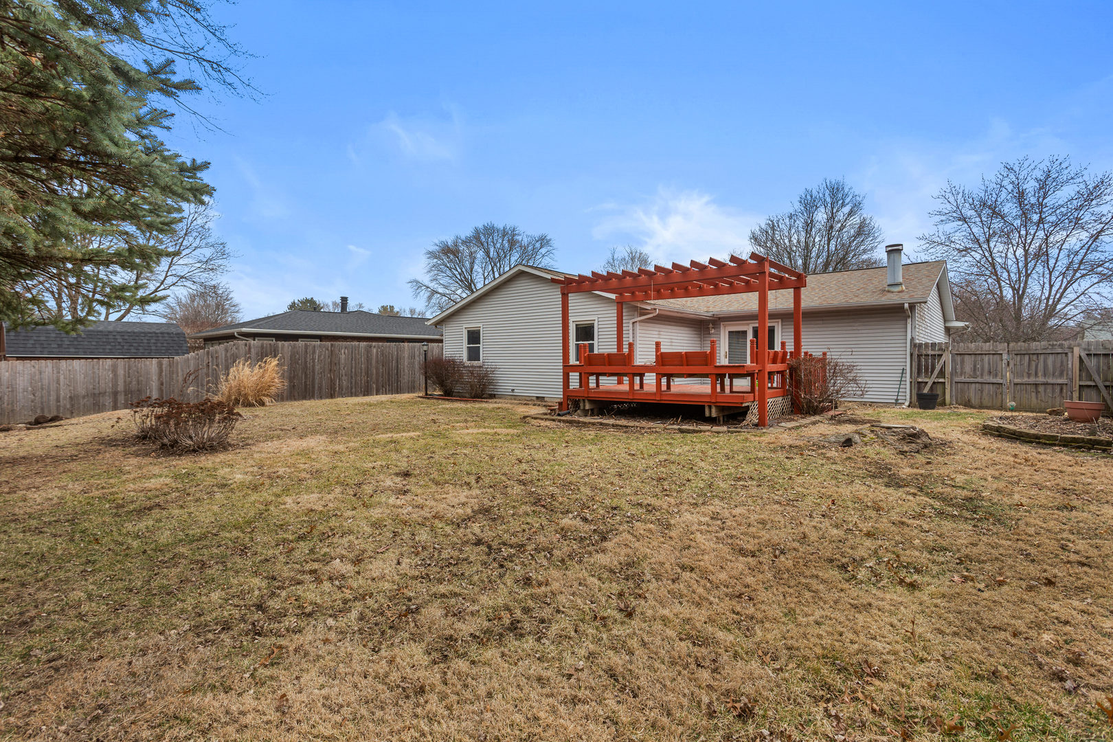 2211 Carlisle Drive Champaign, IL 61821 - Photo 29 of 34 a front view of a house with a yard