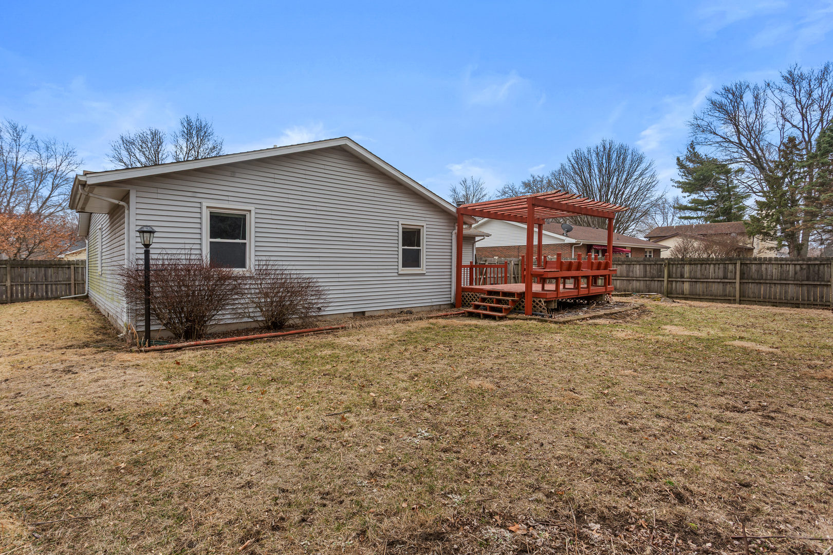 2211 Carlisle Drive Champaign, IL 61821 - Photo 31 of 34 a view of a house with a yard