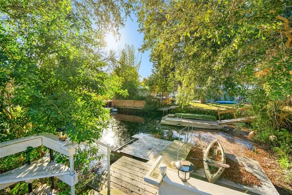 a view of a yard with trees