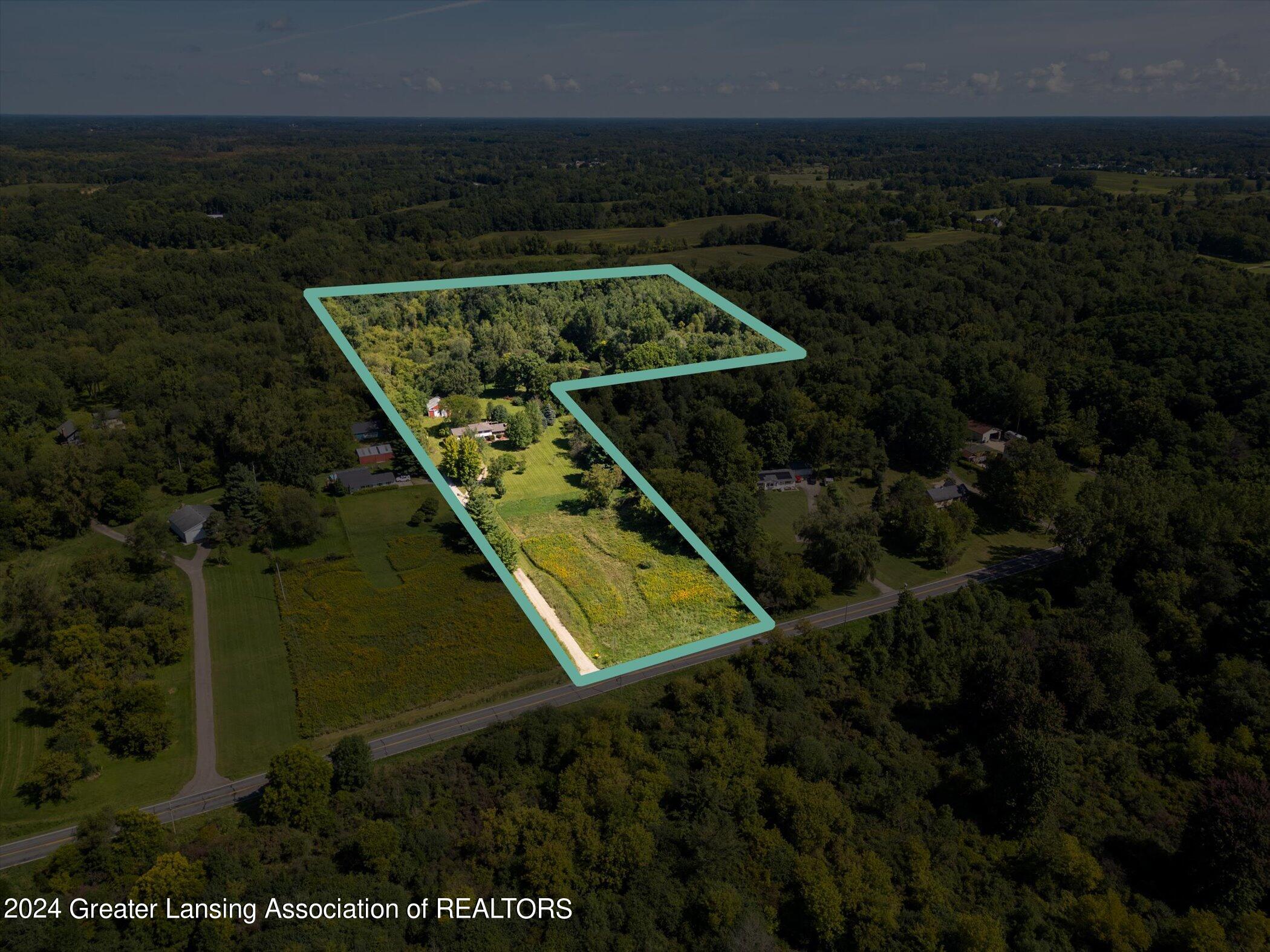6099 Sleight Road Bath, MI 48808 - Photo 2 of 70 67-6099-Sleight-Rd-WindowStill-Real-Esta