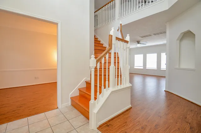 a view of entryway with wooden floor