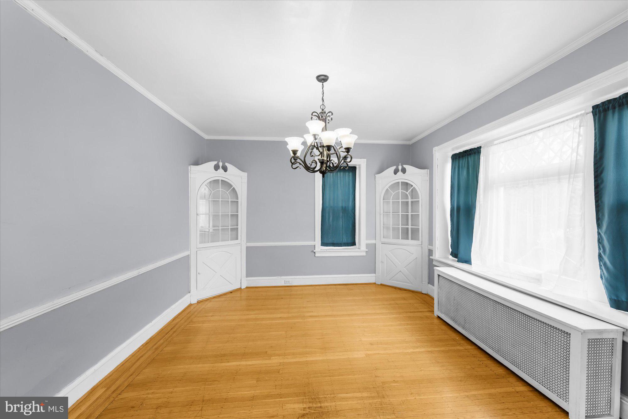 305 Lansdowne Road Havertown, PA 19083 - Photo 13 of 45 a spacious bathroom with a tub and chandelier