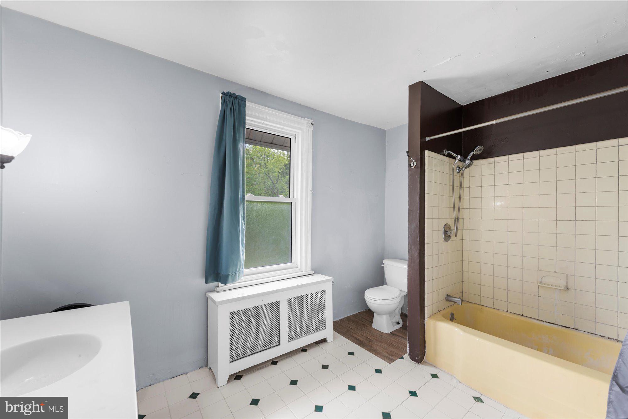 305 Lansdowne Road Havertown, PA 19083 - Photo 30 of 45 a bathroom with a sink a toilet and shower