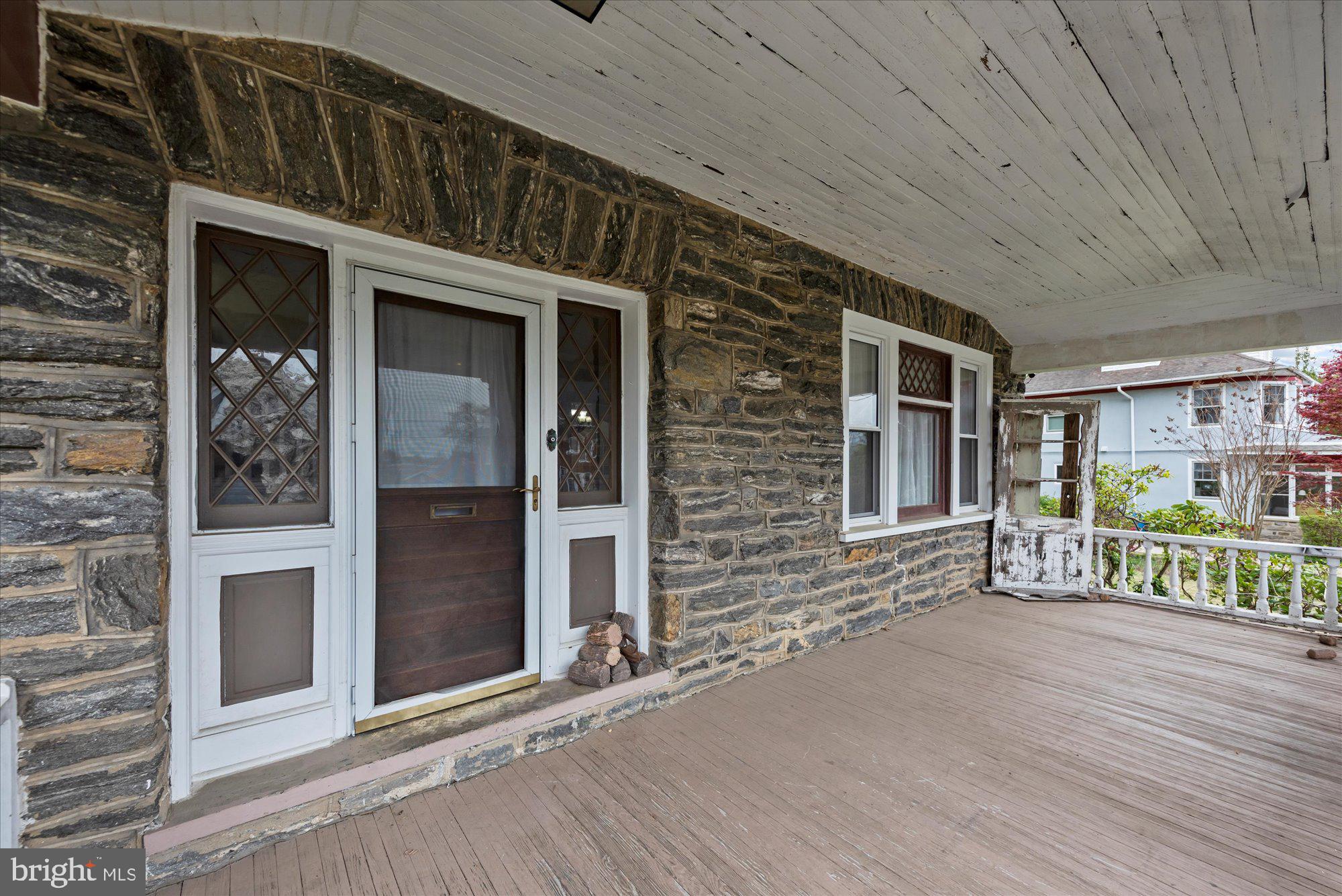 305 Lansdowne Road Havertown, PA 19083 - Photo 4 of 45 a view of a brick house with an outdoor space