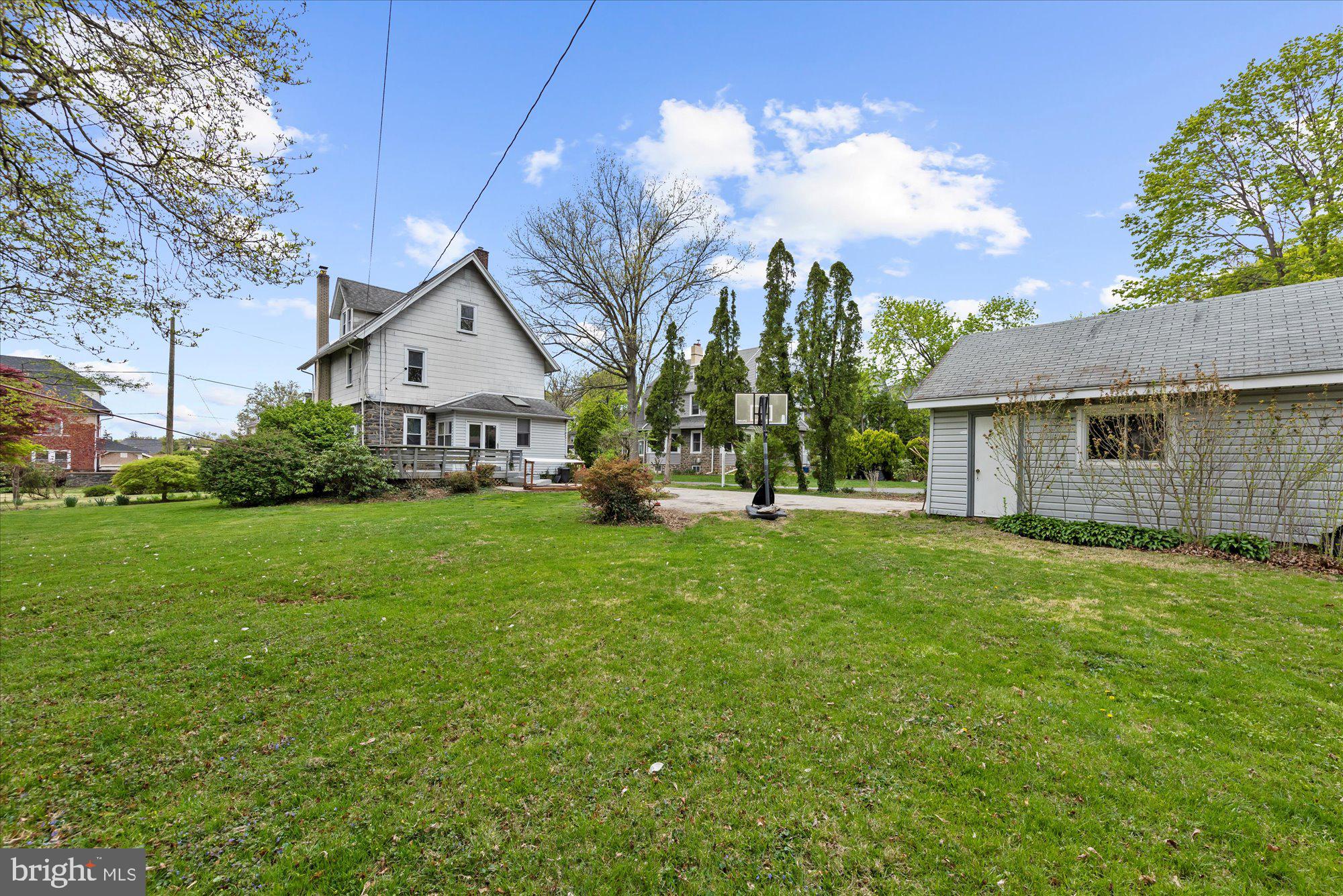 305 Lansdowne Road Havertown, PA 19083 - Photo 6 of 45 a front view of a house with garden