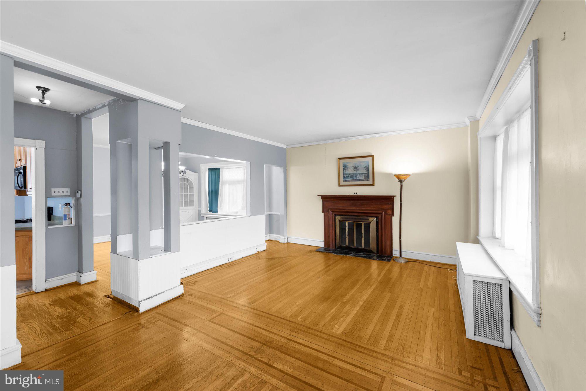 305 Lansdowne Road Havertown, PA 19083 - Photo 10 of 45 a bedroom with a bed and wooden floor