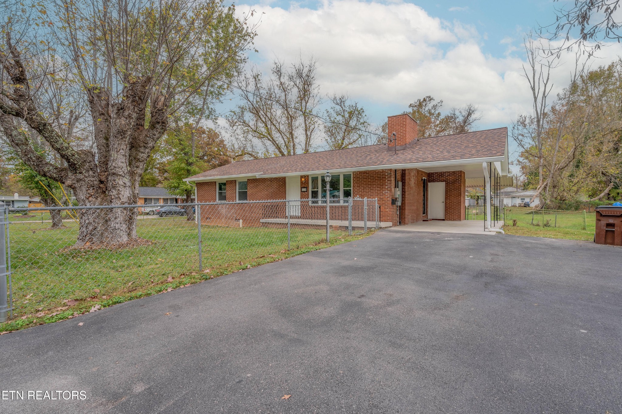 115 Manchester Road Oak Ridge, TN 37830 - Photo 2 of 22 a view of a house with a yard