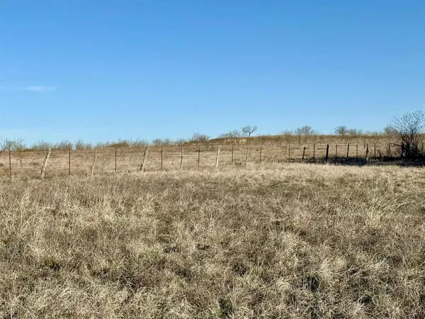 a view of lake with lots of tress in background