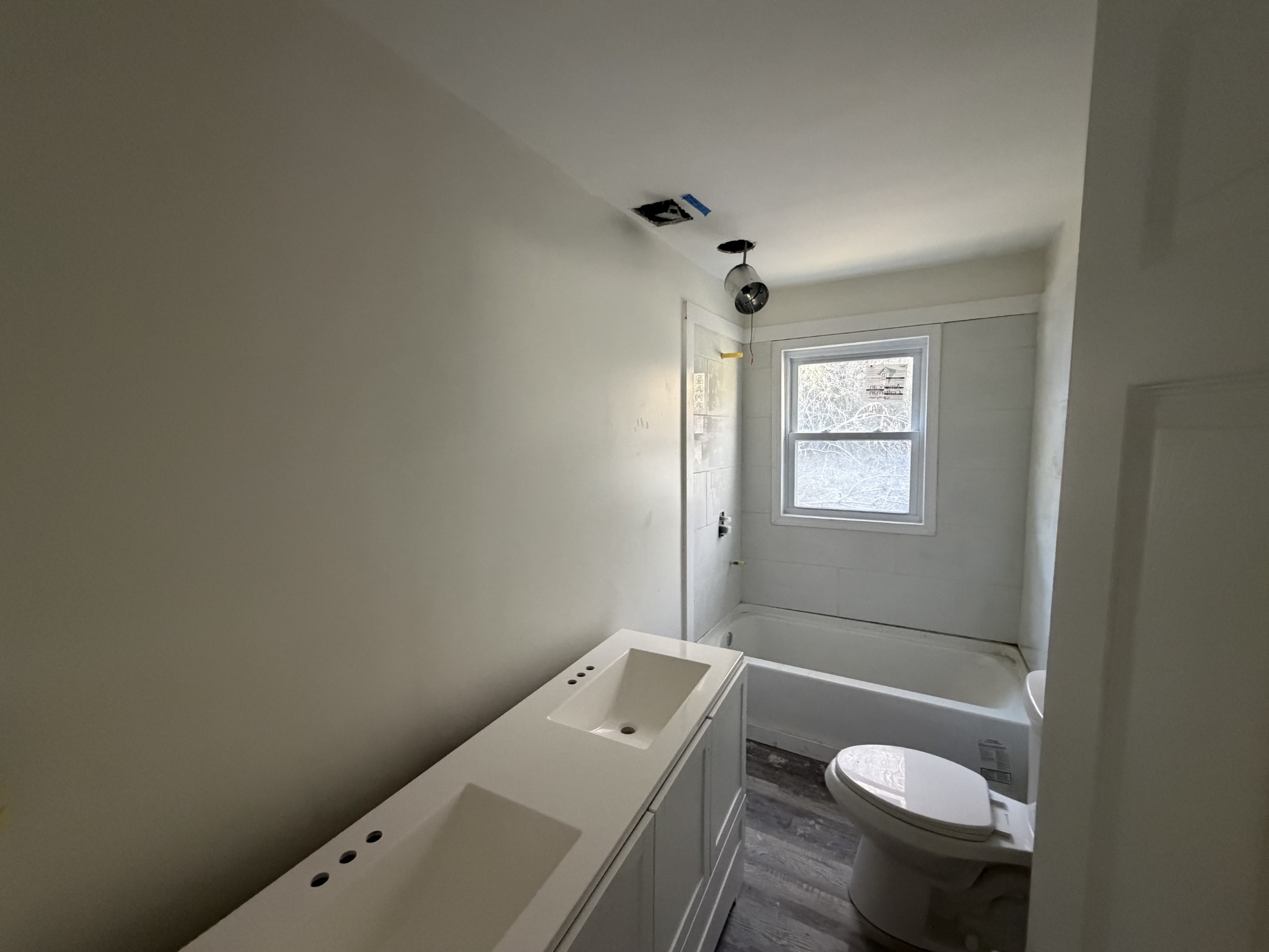 951 State Highway 99 Waynesboro, TN 38485 - Photo 15 of 27 a bathroom with a granite countertop sink toilet and shower