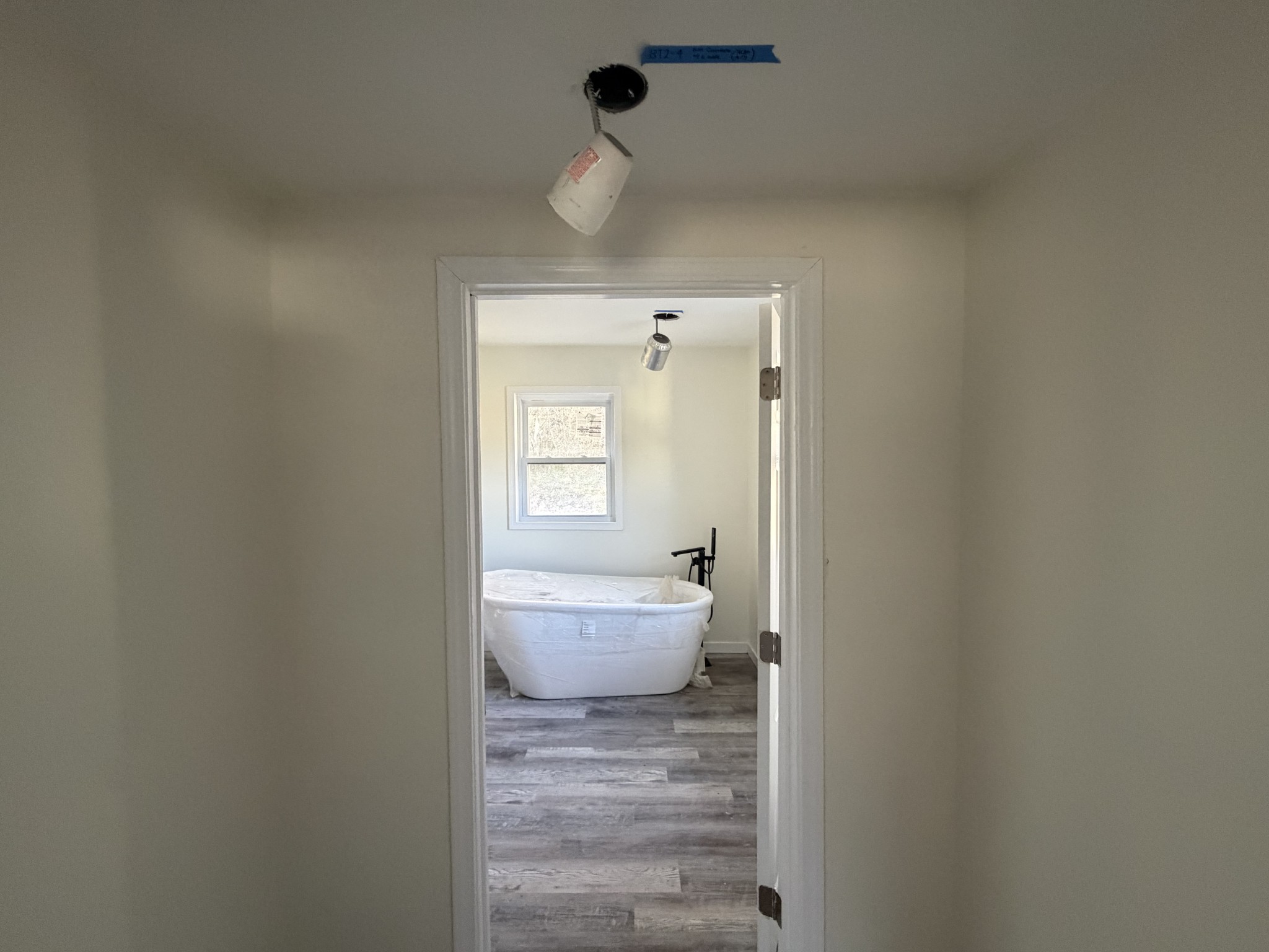 951 State Highway 99 Waynesboro, TN 38485 - Photo 19 of 27 a bathroom with a toilet sink and mirror