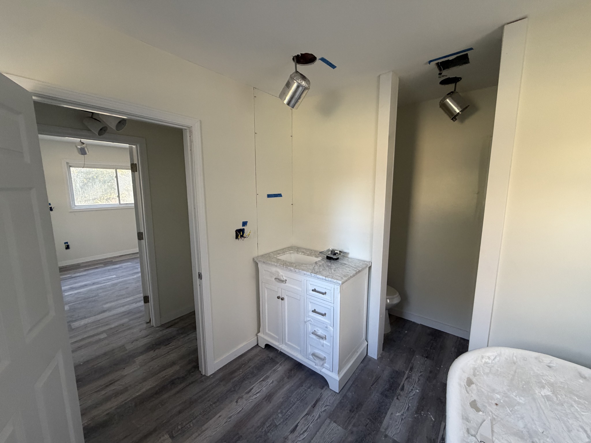 951 State Highway 99 Waynesboro, TN 38485 - Photo 24 of 27 a hallway with closet and wooden floor