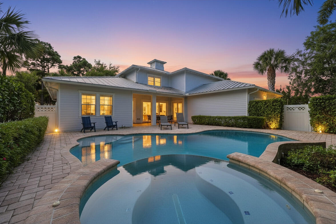 3443 South Caroline Street Jupiter, FL 33458 - Photo 2 of 60 a view of a house with outdoor space