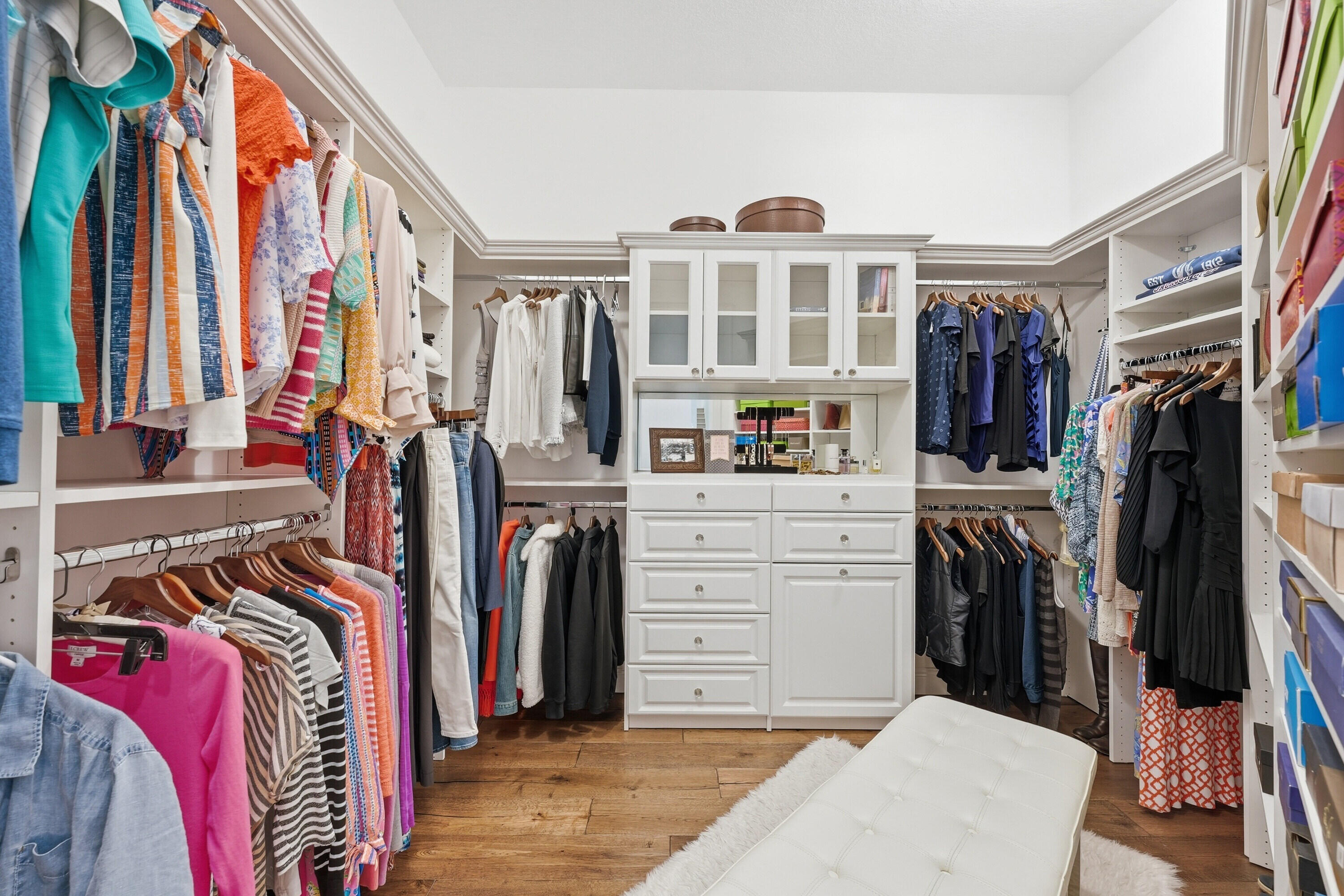 3443 South Caroline Street Jupiter, FL 33458 - Photo 22 of 60 a view of walk in closet with clothes and shoes