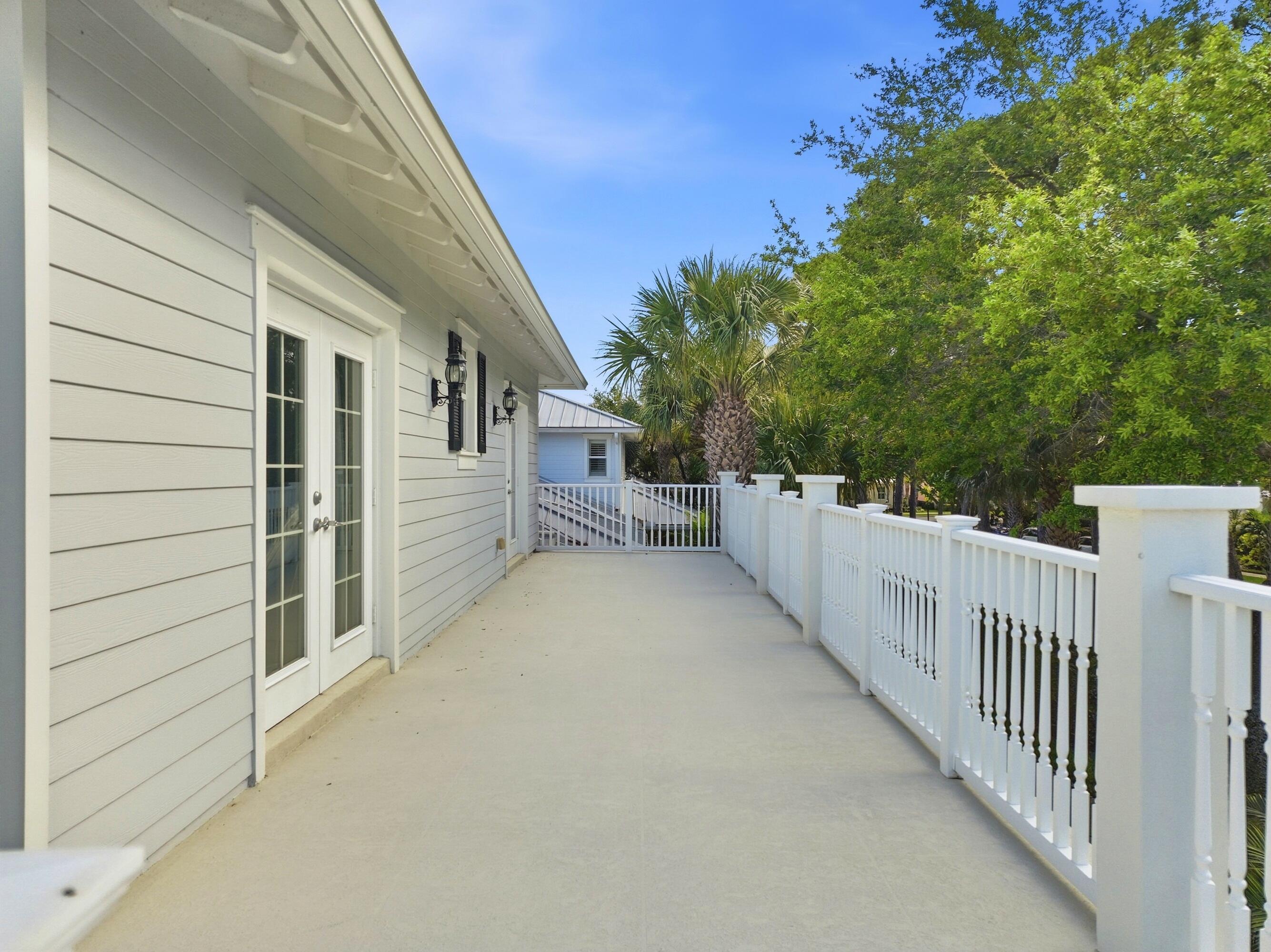 3443 South Caroline Street Jupiter, FL 33458 - Photo 31 of 60 a view of a porch
