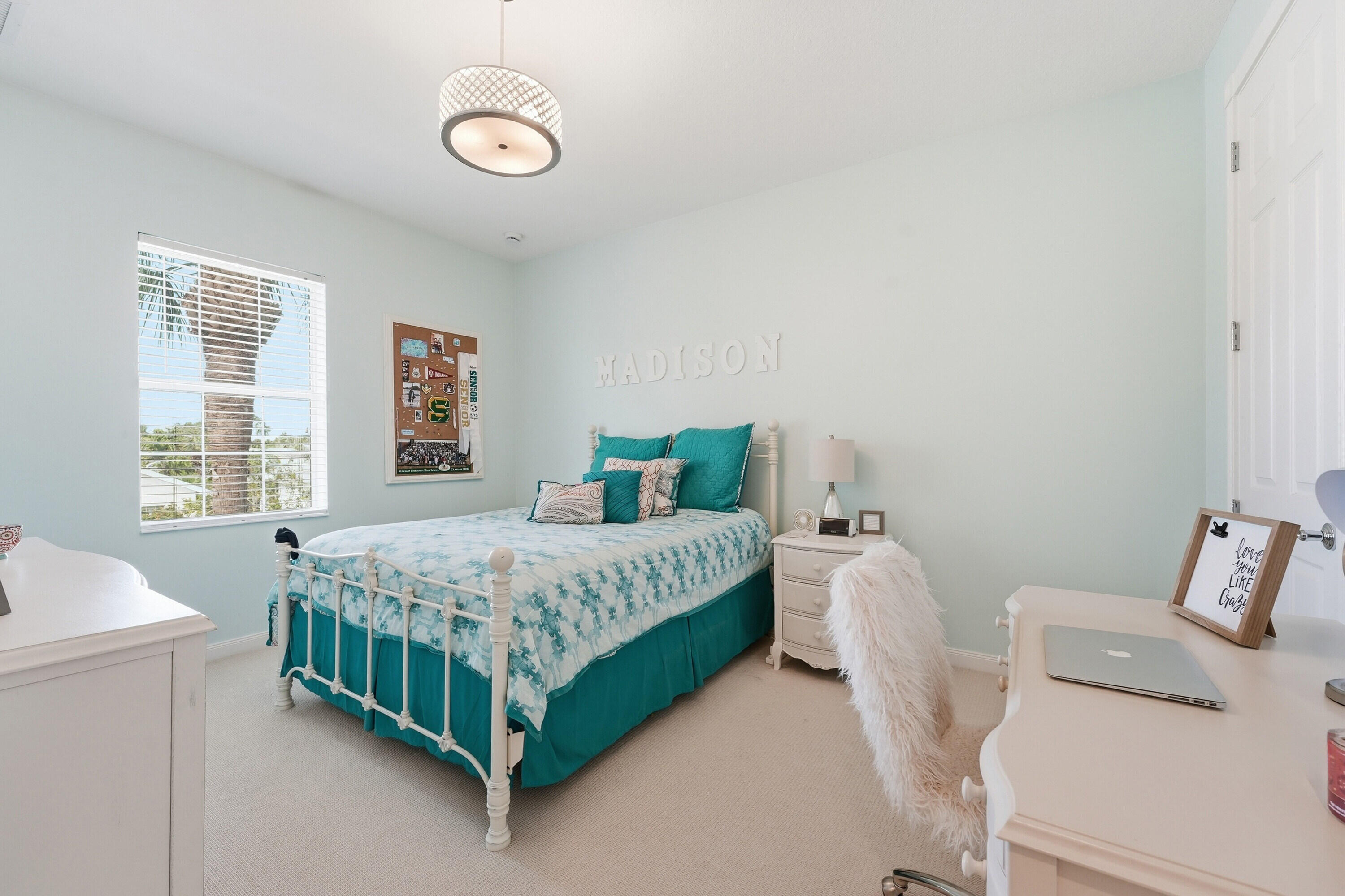 3443 South Caroline Street Jupiter, FL 33458 - Photo 33 of 60 a bedroom with a bed and a table