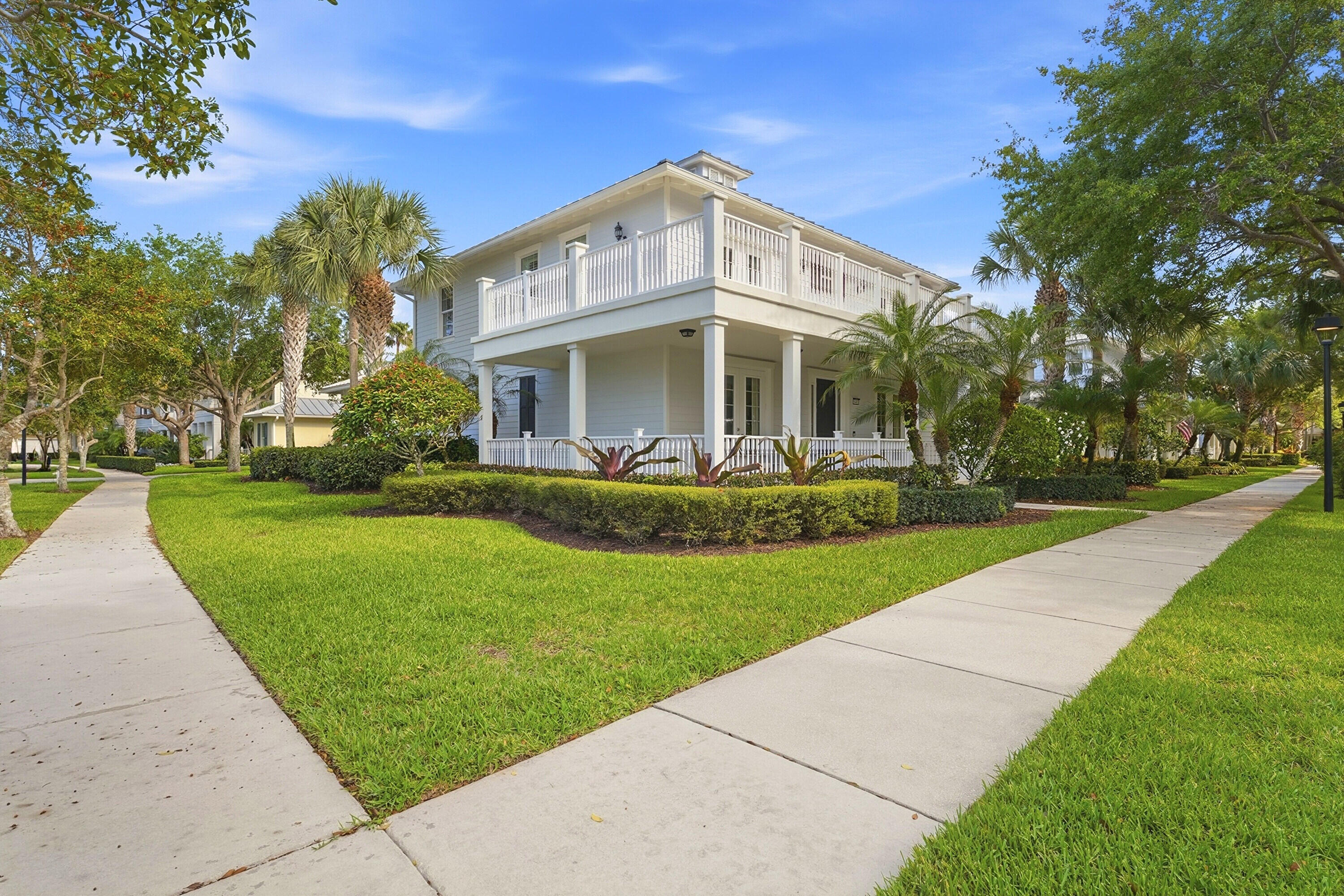 3443 South Caroline Street Jupiter, FL 33458 - Photo 42 of 60 a front view of a house with a yard
