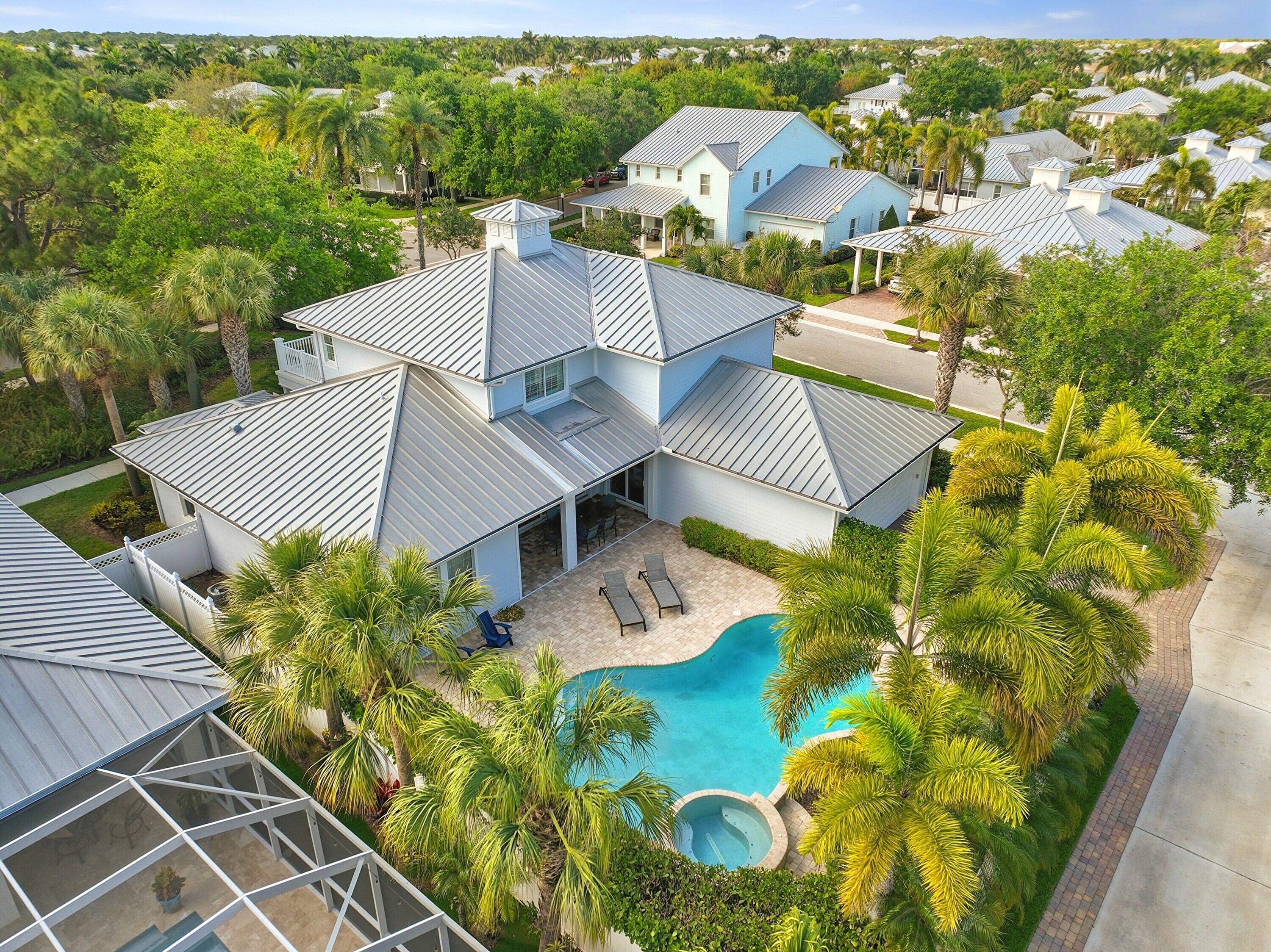3443 South Caroline Street Jupiter, FL 33458 - Photo 49 of 60 an aerial view of a house with garden space and street view