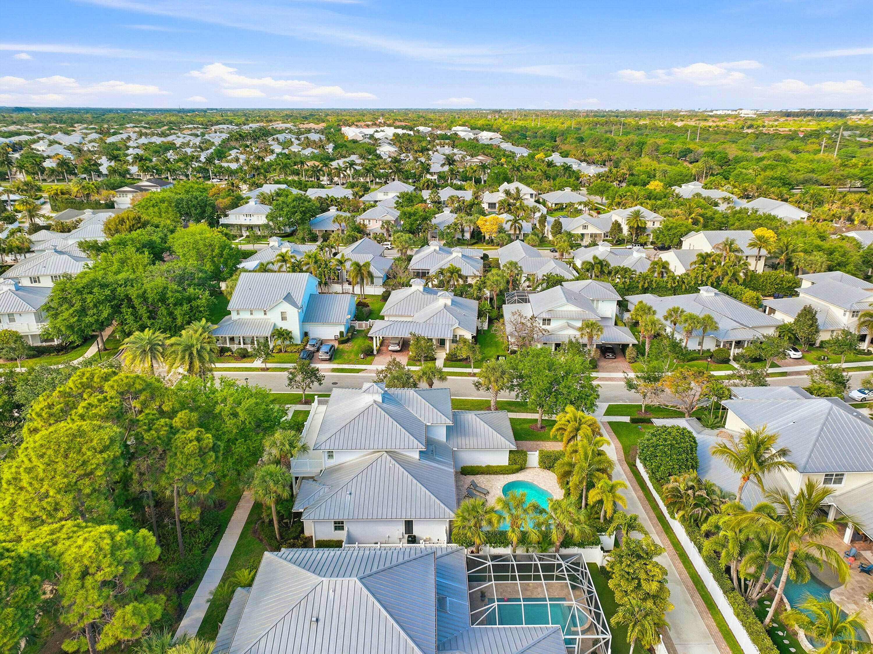 3443 South Caroline Street Jupiter, FL 33458 - Photo 52 of 60 an aerial view of residential houses with outdoor space