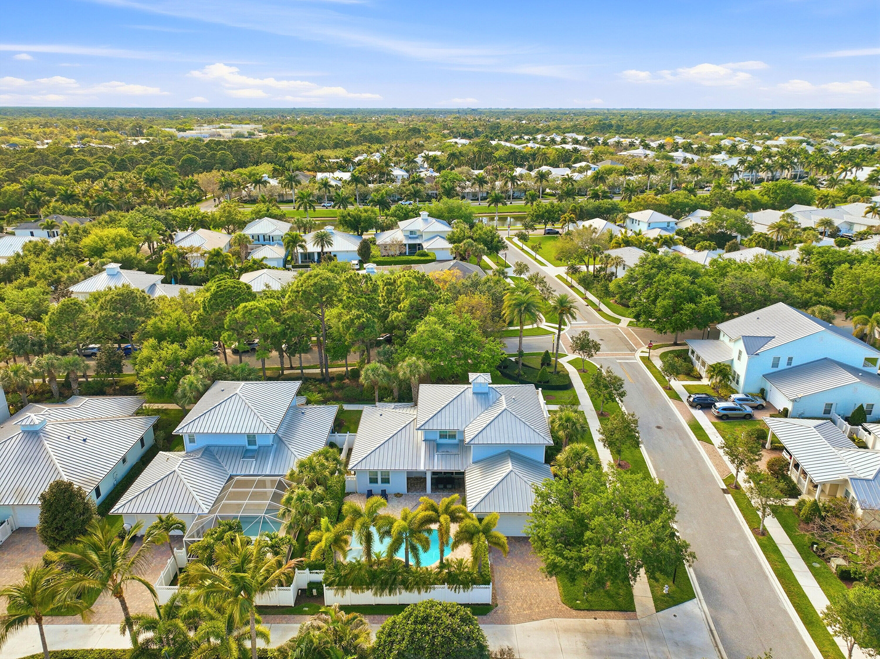 3443 South Caroline Street Jupiter, FL 33458 - Photo 53 of 60 an aerial view of residential houses with outdoor space