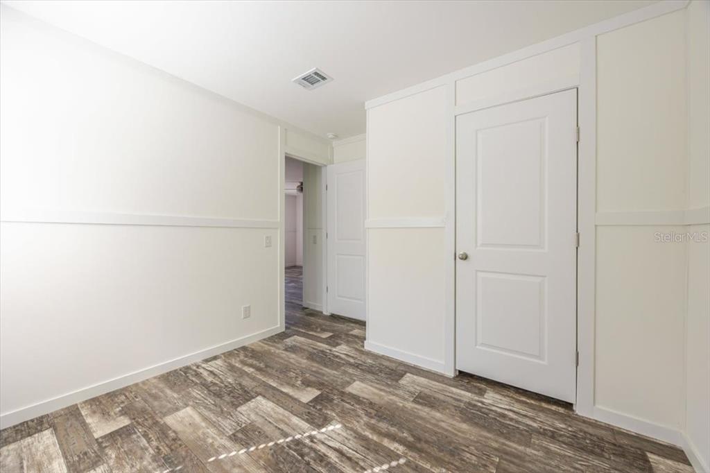 326 Smith Road Polk City, FL 33868 - Photo 12 of 26 a view of a closet in a room