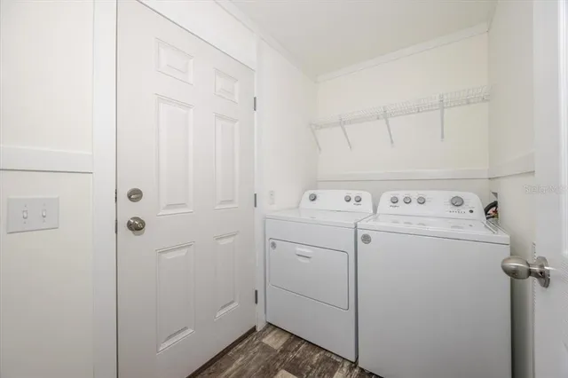 a utility room with dryer and washer