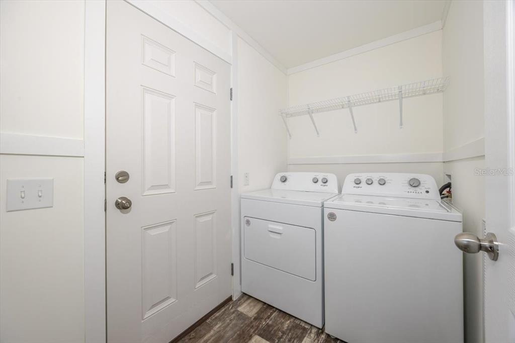 326 Smith Road Polk City, FL 33868 - Photo 18 of 26 a utility room with dryer and washer