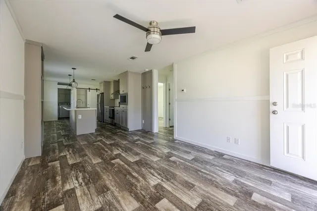 a view of a livingroom with a furniture