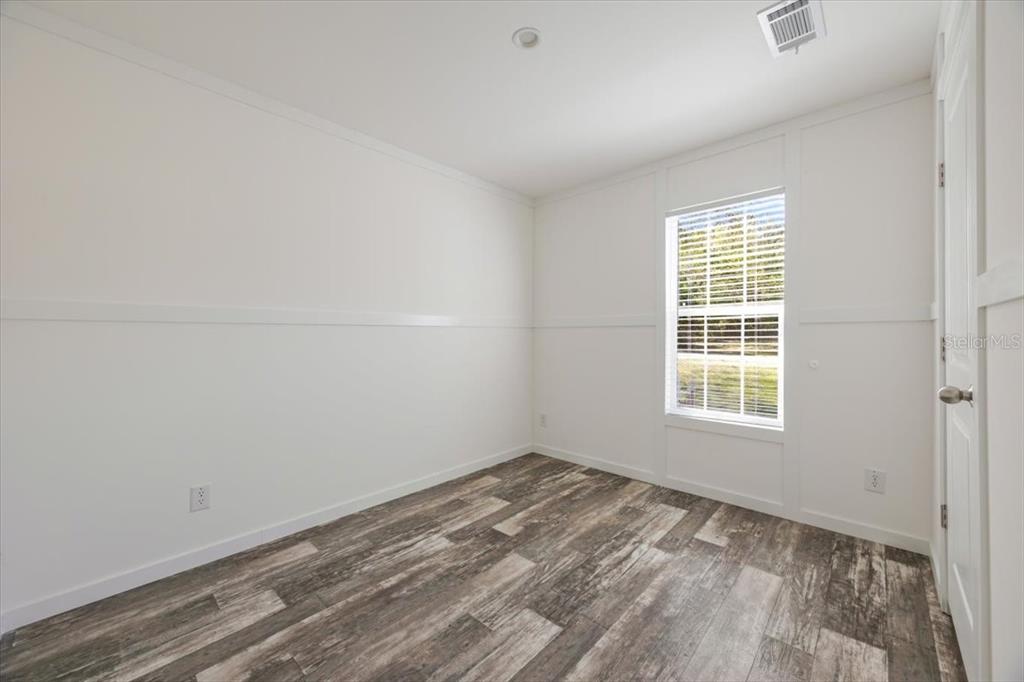 326 Smith Road Polk City, FL 33868 - Photo 8 of 26 an empty room with a window
