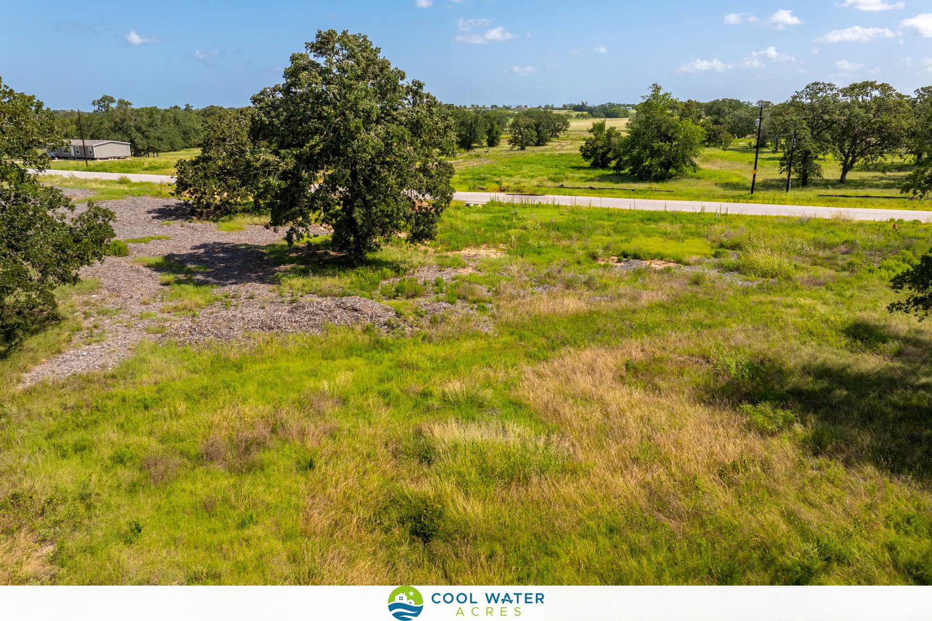 1054 Ferguson Loop Dale Dale, TX 78616 - Photo 12 of 12 a view of yard with swimming pool and green space