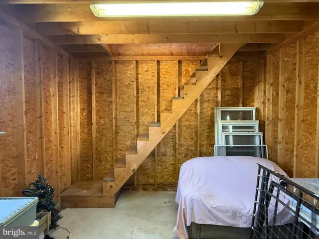 a balcony with table and chairs