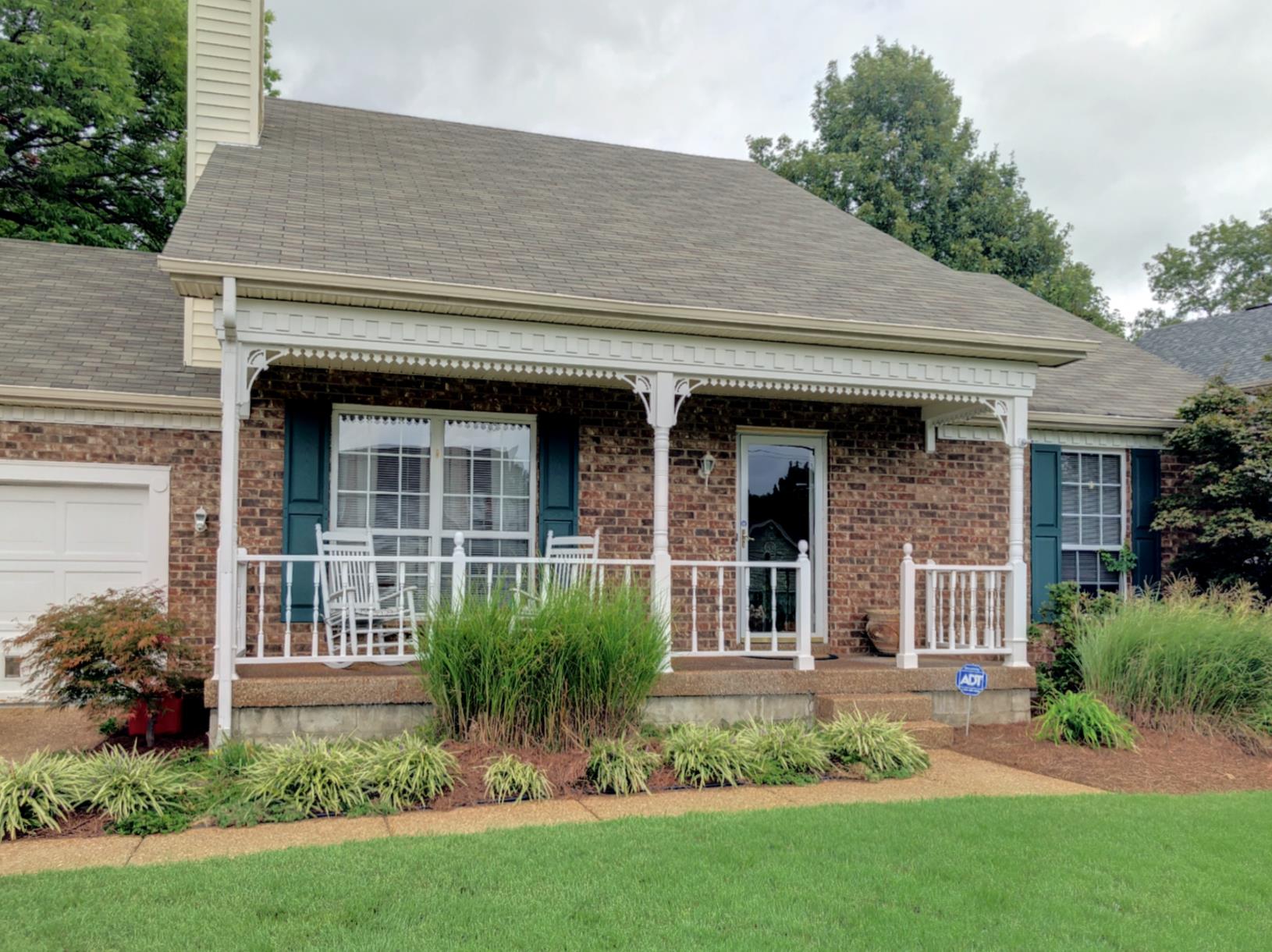 3444 Country Way Road Antioch, TN 37013 - Photo 2 of 19 a front view of a house with a garden and plants
