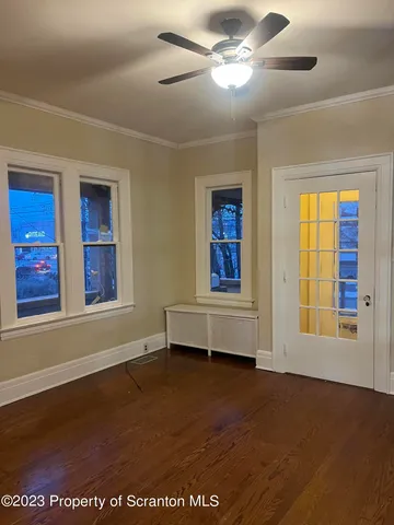 a view of livingroom with hardwood floor and window