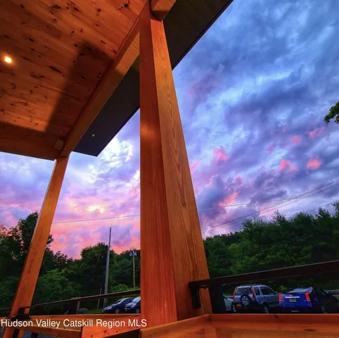 a view of balcony with two trees