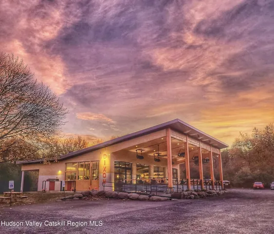front view of a house with a view of residential houses