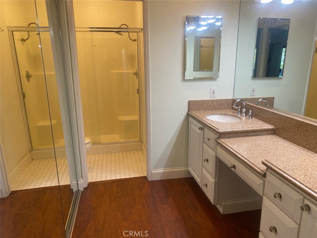 454 Walker Road San Dimas, CA 91773 - Photo 9 of 14 a bathroom with a sink and a mirror