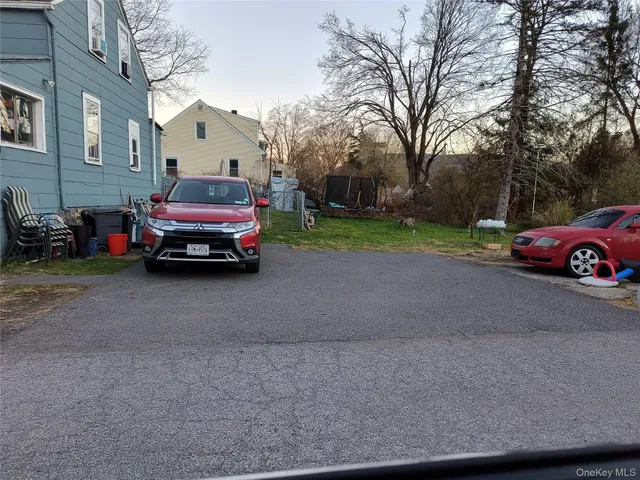 a car parked in front of a house