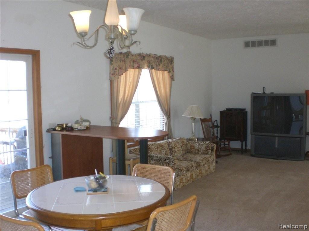 2570 West Drahner Road Oxford, MI 48371 - Photo 11 of 17 Formal Dining Looking into GR!
